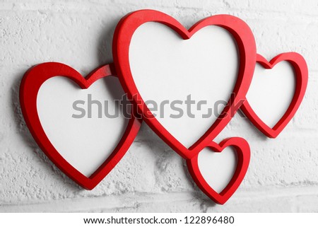 heart picture frame on white wall,valentine decoration.
