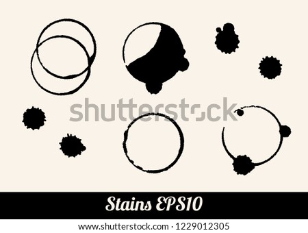 Set of 9 round black grunge circle ring stains, wine or coffee, isolated on white background. Monochrome vector illustration EPS10