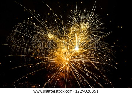 Fireworks Overlay for artwork design idea on Holiday Festival New Year Cerebration Season Greeting The colorful light shooting in the sky   Royalty-Free Stock Photo #1229020861