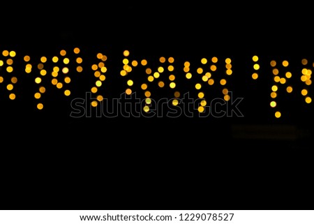 Overlay Golden Light Bokeh on Back for artwork design background decoration season greeting theme new year party holiday festival 
