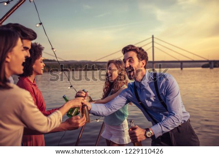 Friends having fun at boat party