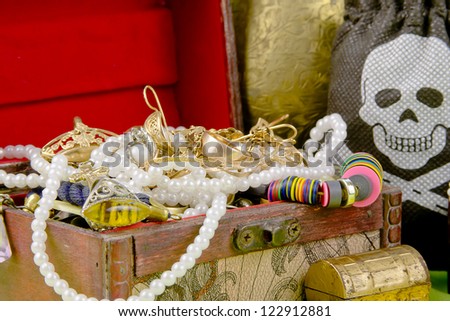 small box with treasures on a light green background