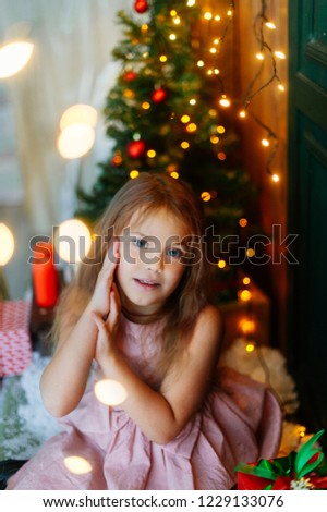 The girl is preparing for the new year and Christmas