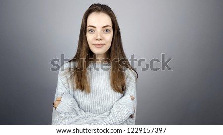 
a portrait of a confident young woman