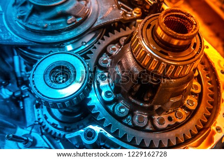 Car Automatic transmission gears. Automotive repair workshop garage mechanic. Dual tone lighting blue and orange. Royalty-Free Stock Photo #1229162728