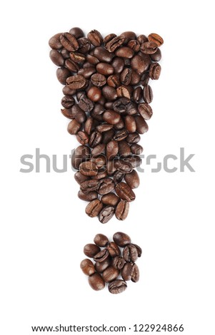 Close-up shot of coffee beans forming an exclamation mark against white surface.
