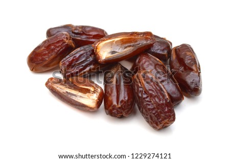 Dried dates (fruits of date palm Phoenix dactylifera). Infinite depth of field, retouched, clipping paths