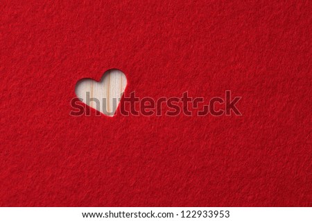 Red felt with heart. Background Valentine's Day