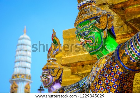 Close Up Guardian of the Golden Pagoda in Wat Phra Kaew Grand Palace The most famous tourist attraction in Bangkok, Thailand.Thai art is beautiful and is considered a national treasure.
