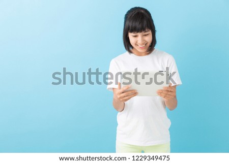 asian girl ,tablet computer