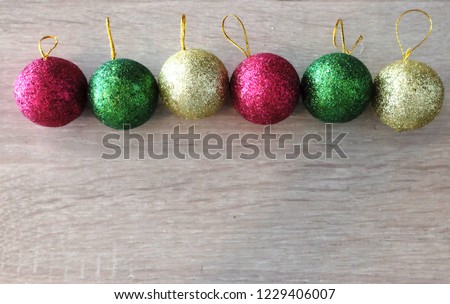 Flat lay and top view . celebration concept Christmas background with shiny balls and on wooden background with copy space. Christmas and New Year concept