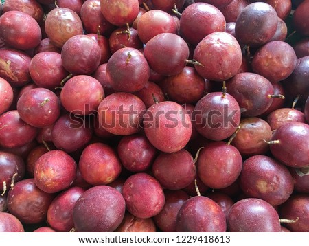 passion fruit on market, closeup photo. Passion fruit texture
