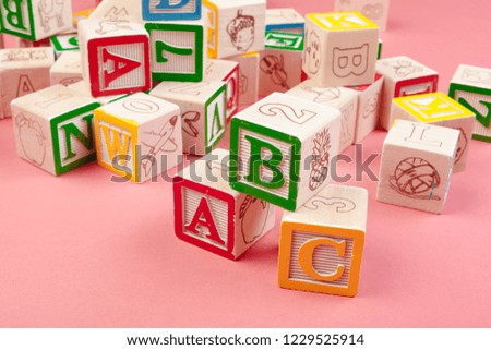 Letters background. Wooden cubes with letters with copy space