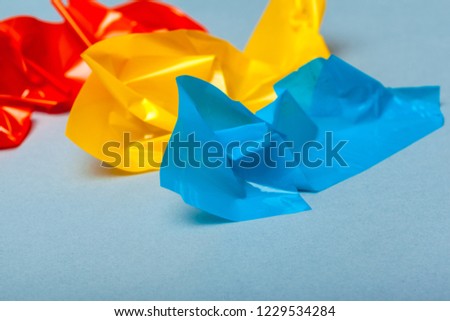 Pieces of paper and adhesive tape on paper background