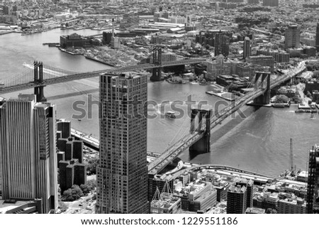 New York cityscape. Top view on Brooklyn Bridge, USA. BW