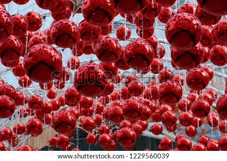 Red baubles hanging to decorate for Christmas holiday in Bangkok Thailand.