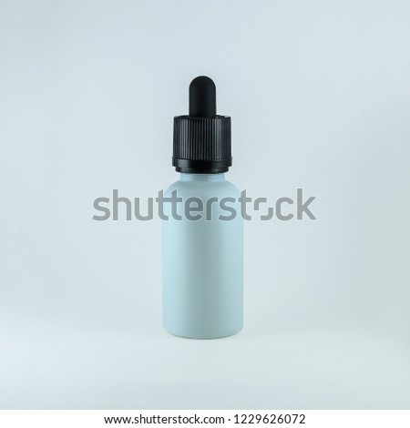 Glass white open bottle cap black pipette 30ml matte on a light background
