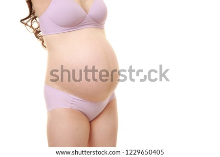  pregnant woman wearing purple bras and panties