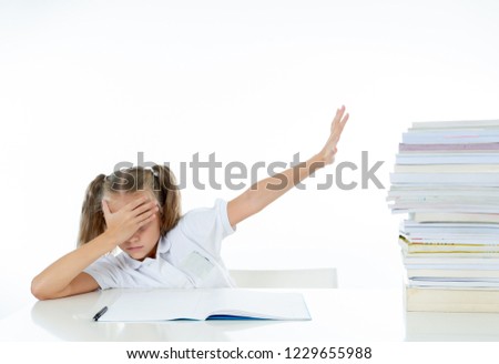 Frustrated little schoolgirl feeling a failure unable to concentrate in reading and writing difficulties learning problem attentional disorders special needs and low academic performance concept.