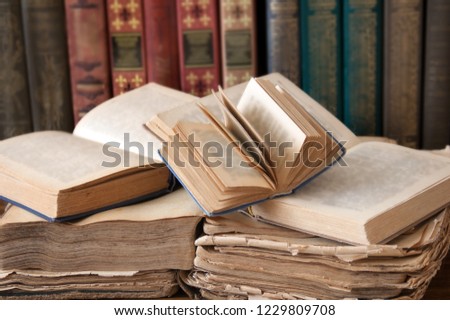 book shelf, books pile with antique books  Royalty-Free Stock Photo #1229809708