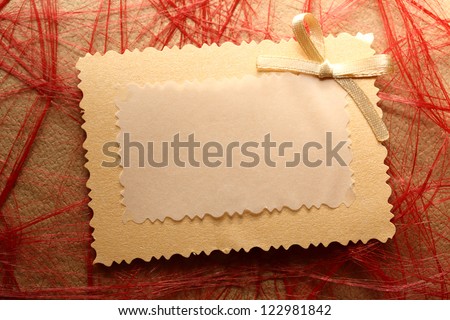 Blank greeting card on checked background