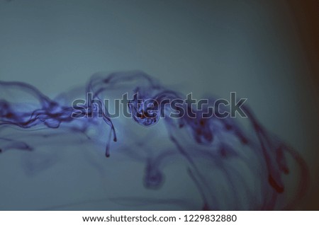 Inspiration by nature. Swirl of paint, nature pattern, ink, painting, patterns in the water, patterns of ocean circulation. Ocean, sea, water. Underwater miracle. Luminescent. Background, wallpaper. 