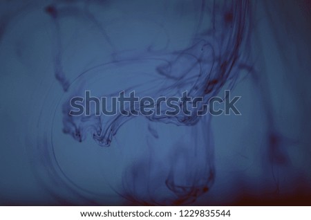 Ocean, sea, water. Swirl of paint, nature pattern, ink, painting, patterns in the water, patterns of ocean circulation. Underwater miracle. Inspiration by nature. Luminescent. Background, wallpaper. 