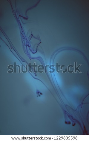 Ocean, sea, water. Swirl of paint, nature pattern, ink, painting, patterns in the water, patterns of ocean circulation. Underwater miracle. Inspiration by nature. Luminescent. Background, wallpaper. 