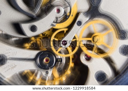 The mechanism of analog hours. working clock mechanism. A photo close up