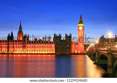 Enlighted Palace of Westminster (houses of Parliament) and Big Ben at dusk, seen from the other side of the Thames, London, United Kingdom