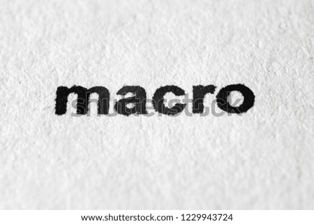 The word Macro on white paper in the macro mode
