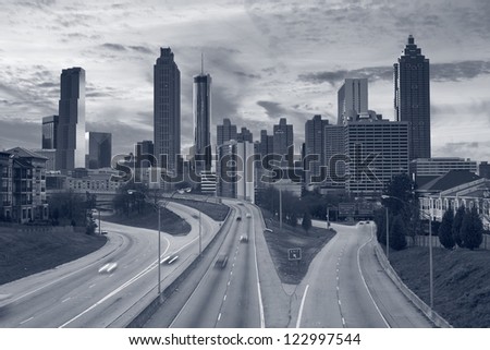 Atlanta. Toned image of Atlanta skyline and highway leading to the city.