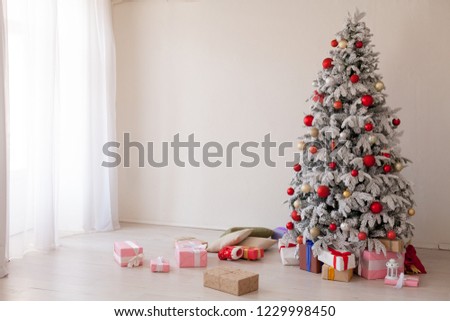 Xmas new year gifts and toys tree winter background