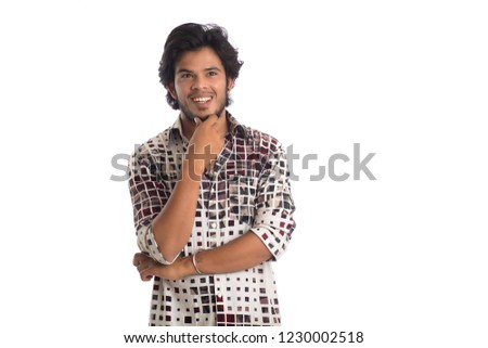 Young man posing on a white background