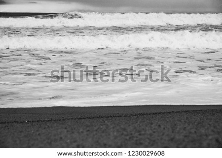 Storm on the beach in black & white