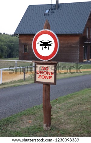 ban on flying a dron with the inscription and a crossed out sign
