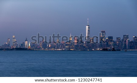 Long exposure photo of a Lower Manhattan skyline taken moments after sunset from Staten Island