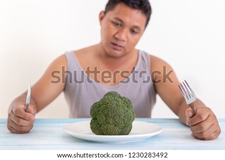 overweight man bored of dieting. Health care concept.