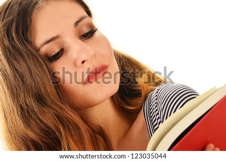 Young woman reading a book isolated on white. Female student learning