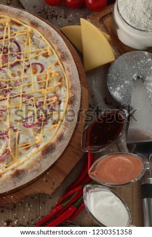 Pizza on a wooden tray