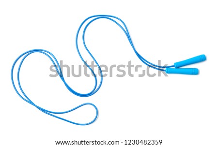 Jump rope on white background, top view Royalty-Free Stock Photo #1230482359
