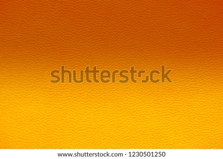 Texture of genuine orange leather