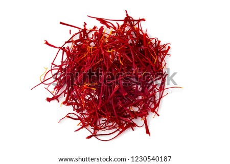 Saffron spice threads (strands) isolated on white background Royalty-Free Stock Photo #1230540187