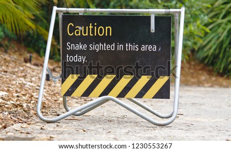 Watch out for snake sign in park in Australia