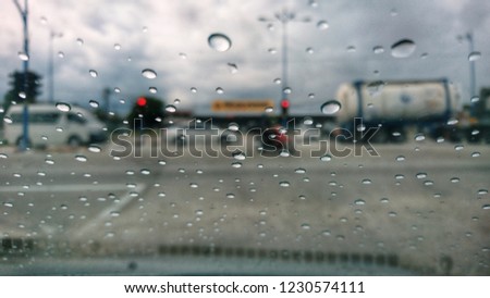 Rain drops on the car window. Selective focus. 