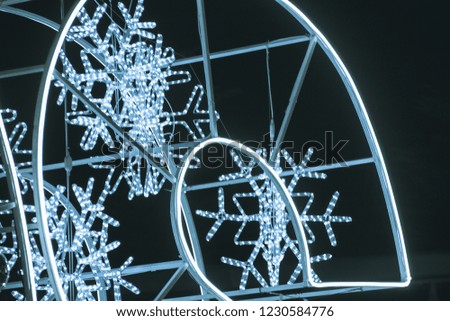 Abstract Blur of Christmas Snowflake Heart Bokeh Background.
