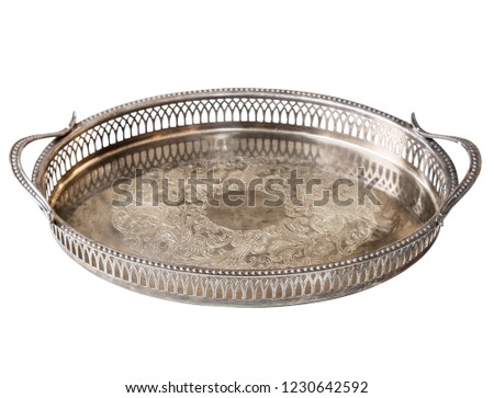 Empty metal old Antique silver tracery tray isolated on white background. Retro style.
 Royalty-Free Stock Photo #1230642592
