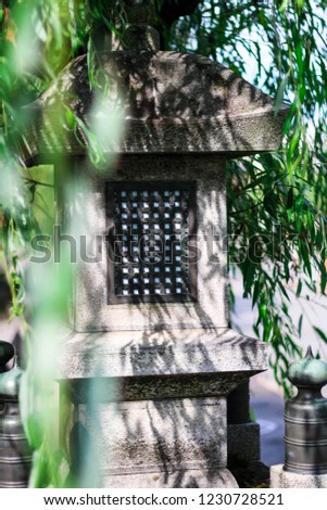Stone lantern in Japanese garden.