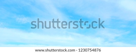 Beautiful blue sky with white fluffy clouds background. Turquoise color blured photography