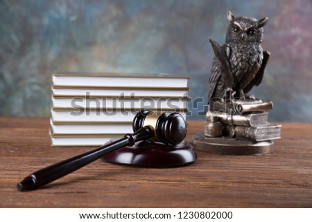Lawyers office background. Law symbols composition on gray stone background.